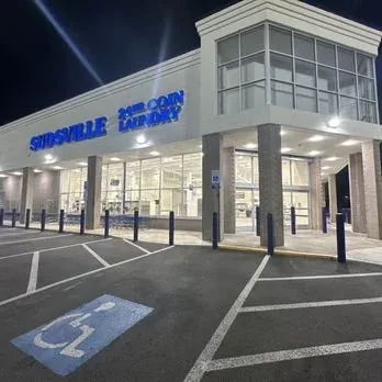 Sudsville 24HR Coin Laundry night exterior